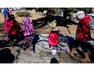 Syrian refugee children make their way from the hotel to a local rec centre for some circus fun put on by the Green Fools in Calgary, Ab., on Tuesday February 23, 2016.