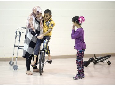 Syrian refugee families enjoy some fun at a rec-centre on Tuesday February 23, 2016.