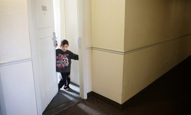 Syrian refugee families spent their first couple of weeks in Calgary living in a hotel. One playful newcomer is pictured on February 23, 2016.