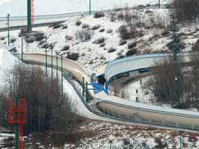 This barricade on the bobsled track was replaced after a collision in 1992, says a former bobsledder.