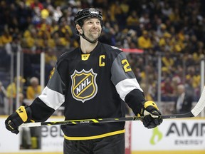 Pacific Division forward John Scott looks into the stands during the NHL hockey All-Star championship game against the Atlantic Division Sunday, Jan. 31, 2016, in Nashville, Tenn. The Pacific Division won 1-0 and Scott was named most valuable player. (AP Photo/Mark Humphrey)