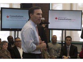 Federal Finance Minister Bill Morneau participates in a town hall meeting ahead of pre-budget consultations in Ottawa on Monday, Feb. 22, 2016.