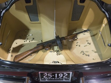 A machine gun replica sits in the back of a 1949 Cadillac during the World of Wheels show at the BMO Centre in Calgary, Alta., on Sunday, Feb. 21, 2016. The popular auto-enthusiast show was in its 50th year. Lyle Aspinall/Postmedia Network