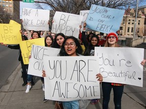 About 50 youngsters from Youth Central spread well wishes, positive messages and happiness to those on Stephen Avenue Mall, turning it into Happiness Avenue in  Calgary, on Saturday, March 5, 2016.