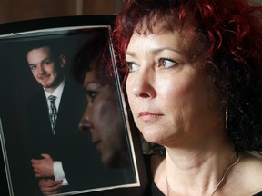 Sparla McCann holds a photograph of her late son Rory at home Wednesday October 28, 2015. He died of a fentanyl overdose this year at the age of 19. She says naloxone, an antidote that reverses the effects of opioid overdoses, could have saved her son's life.