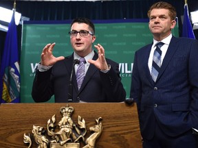 Wildrose Leader Brian Jean (R) and Wildrose House Leader Nathan Cooper.