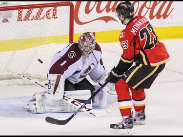 Calgary Flames Sean Monahan is stopped by Colorado Avalanche goalie Semyon Varlamov in the shootout in NHL hockey action at the Scotiabank Saddledome in Calgary, Alta. on Friday March 18, 2016. The Flames lost to the Avalanche 4-3 in the shootout. Mike Drew/Postmedia