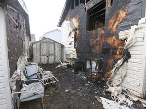 Flames ravaged a home on Saddlemont Crescent NE in Calgary, Alta on Friday March 11, 2016.