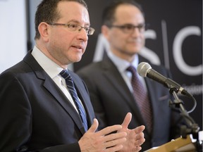 Stan Magidson, left, was named chairman and chief executive of the Alberta Securities Commission on Tuesday.