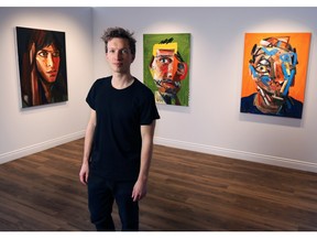 Artist Erik Olson was photographed with work from his latest gallery show at the Barbara Edwards Contemporary gallery in Calgary on Wednesday March 9, 2016. (Gavin Young/Postmedia)