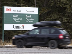 Gavin Young, Calgary Herald CALGARY, AB: December 28, 2011 - Vehicles enter Banff National Park at the park gates on Wednesday December 28, 2011. It may start costing more for Canadians to enjoy the national parks as a variety of fees and increases are being considered by the federal government. (Gavin Young / Calgary Herald) (For A1 section story by Jason Fekete) 00036569A