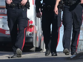 District Four beat patrol officers oversee 17th Avenue SE near 50th Street Wednesday, March 9, 2016. (Ted Rhodes/Postmedia)