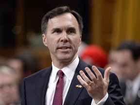 Finance Minister Bill Morneau answers questions after delivering the federal budget in the House of Commons on March 22.