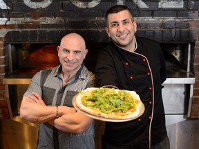 Pizzeria owner Domenico Daprocida, left, and head chef Alessandro Tundo stand in Brooklyn Pizzeria in Calgary, AB., on Thursday, March 24, 2016. The Pizzeria specializes in authentic pizza and gluten free options.