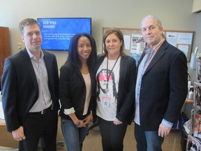 Cal 0319 Brett 1 Bret Hitman Hart (right) shared his prostate cancer journey with members of the media Mar 7 at the Prostate Cancer Centre. Hart underwent Robotic prostatecomy on Feb 10 with renowned urologist Dr. Eric Hyndman (left) at this side. Pictured as well are Hart's wife Stephanie Washington-Hart and Prostate Cancer Centre executive director Pam Heard.