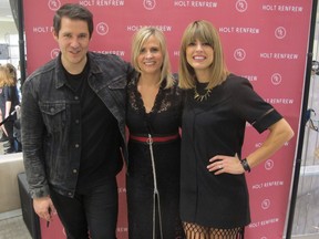 Cal 0319 Holts 1  Pictured at Amped for the Junos MusiCounts Charity Shopping Event held at Holt Renfrew Mar 9 are Holt Renfrew's Deb Kerr (centre) with 2016 Juno Nominee Dear Rouge. Dear Rouge is nominated  for Breakthrough Group of the Year. The husband and wife duo now live in Vancouver and   recently made it to #2 on Canadian billboards.