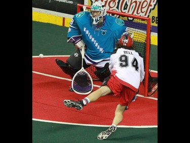 The Calgary Roughnecks' Tyson Bell couldn't get this shot past the Rochester Knighthawks' Matt Vinc during National Lacrosse League action at the Scotiabank Saddledome in Calgary on Saturday March 5, 2016. Calgary lost 9-8 in overtime.