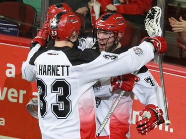 The Calgary Roughnecks celebrate scoring on the Rochester Knighthawks' during National Lacrosse League action at the Scotiabank Saddledome in Calgary on Saturday March 5, 2016. Calgary lost 9-8 in overtime.