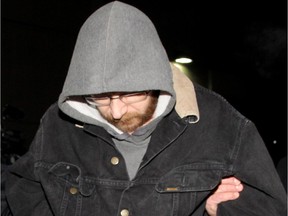 Will Rempel, a suspect in the Ryan Lane murder, is taken into the Court Services building in Calgary on Nov. 29, 2012.