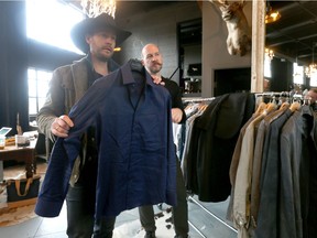 Calgary designer Paul Hardy is pictured in his work space with musician Paul Brandt in Calgary, Alta  on Monday February 22, 2016. Brandt, who has been working with the designer for six years,  will be hosting and performing at the 2016 JUNO Songwriters' Circle co-presented this Sunday.