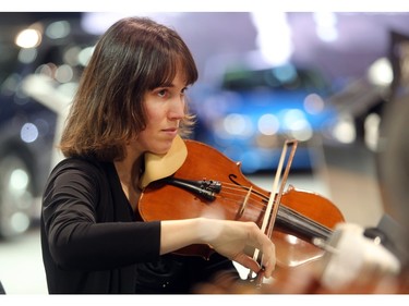 Violinist Liza Scriggins of the Allegra string quartet performs at the Vehicles and Violins Gala Tuesday night March 8, 2016 at the BMO Centre. Sponsored by the Calgary Motor Dealers Association, the gala is in it's 17th year. This year's beneficiaries are Fresh Start Recovery Centre, The Alex and Children's Cottage Society. (Ted Rhodes/Postmedia)