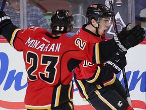 Calgary Flames Johnny Gaudreau celebrates after scoring against the Nashville Predators during NHL hockey in Calgary on Wednesday, March 9, 2016.