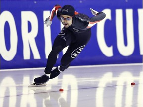 Canada's Gilmore Junio competes during the second of the men's 500 meter races of the Speedskating World Cup final at Thialf ice rink in Heerenveen, Netherlands, Sunday, March 13, 2016.