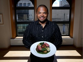Roger Mooking, Juno award winner and celebrity chef, poses at the Telus Convention Centre in Calgary, Ab., on Thursday March 17, 2016, with the main dish, Alberta Love, that he will be serving at the Juno gala dinner. Leah Hennel/Postmedia