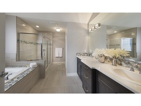 The ensuite in the Hadleigh show home by Crystal Creek Homes in Five Lake at Rock Lake Estates.