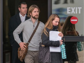 David Stephan and his wife Collet Stephan, leave court with their lawyer Shawn Buckley, left, on March 15, 2016 in Lethbridge, Alberta.  The StephanÕs have been pleaded not guilty to failing to provide the necessities of life for 19-month-old Ezekiel, who died in March 2012 from meningitis.