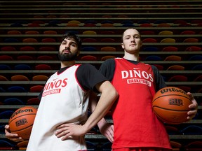 University of Calgary Dinos basketball players Jasdeep Gill (L) and Dallas Karch mug for a photo before a team practice at the university's Jack Simpson Gymnasium in Calgary on Wednesday, March 2, 2016. The pair are considered 'glue' players with the Dinos and are ready to face the University of Alberta this weekend in playoff action.