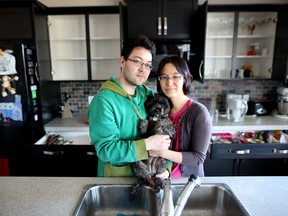 Evelyn and Geoff Tanaka at their home in Calgary, Ab., on Wednesday March 9, 2016, that was recently broken into and ransacked by thieves. They took everything from guitars, dishes to the kids lego and food in the fridge.