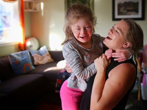 Christina Ryan dances with her daughter Emily Pitchers in 2016.