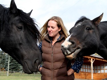 Founder of Whispering Equine is therapist Carrie Watson, surrounded by her equine therapists, who help promote human growth and development.