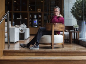 Life of Pi author Yann Martel poses for a photo to promote his new novel The High Mountains of Portugal in Toronto on January 30, 2016.