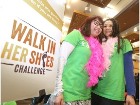 Friends Sarah Li and Christine Yeh attend the kickoff for CARE Canada's Walk in Her Shoes Challenge at the Calgary Zoo on Sunday,  an annual fundraiser to help women and girls lift their communities out of poverty.