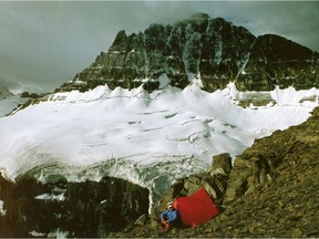 From George Brybycin's book, The Legendary Rockies.
George Brybycin sits by a glacier near Mount Sarbach in 1973.