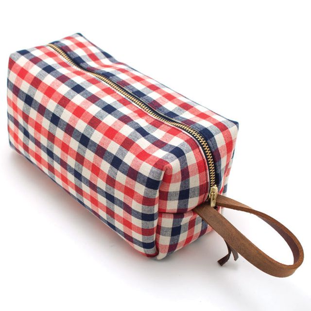 King me This kit bag is perfect for shaving supplies, knick-knacks and all those little things you pick up on your travels. It comes in a variety of patterns, but we’re partial to this stand-out gingham check that will be easy to find in your suitcase. $88 at North American Quality Purveyors, 1207 10th Ave. S.E., 403-910-9913, shopnorthamerican.com. 