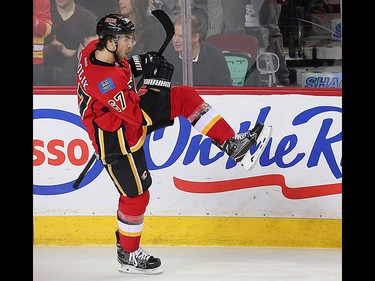 Calgary Flames Michael Frolik celebrates after scoring against the Winnipeg Jets during NHL hockey in Calgary, Alta., on Wednesday, March 16, 2016. AL CHAREST/POSTMEDIA