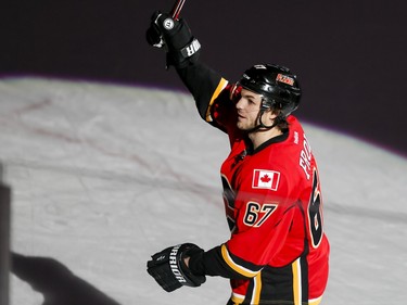 Michael Frolik of the Calgary Flames is named third star against the St. Louis Blues in Calgary, Alta., on Monday, March 14, 2016. The Flames won 7-4. Lyle Aspinall/Postmedia Network