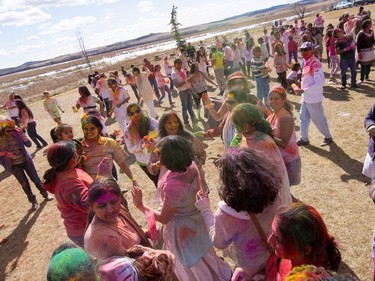 People gather to celebrate the festival of Holi at  Lloyd Park in Calgary, AB., on Saturday, March 26, 2016. Holi, also known as the festival of colours, is a spiritual Hindu festival that marks the arrival of spring.