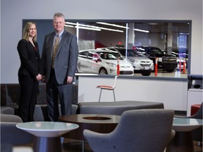 Michael Van Elsberg, deputy senior vice-president of claims for Intact Insurance's western division in Calgary, and Julie Ann Gauthier, manager of the new Intact Service Centre in Calgary.