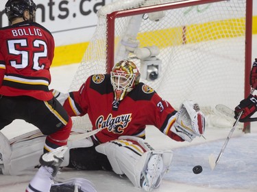 Joni Ortio makes a save during the first period at the Scotiabank Saddledome in Calgary, Ab, on Saturday, March 26, 2016. The Calgary Flames faced off against the Chicago Blackhawks.