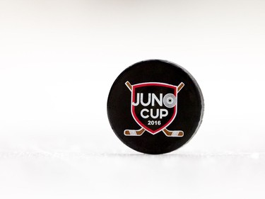 A puck sits on the ice before a Juno Cup practice game at Max Bell Centre in Calgary, Alta., on Thursday, March 31, 2016. Musicians and former NHLers were prepping for the Juno Cup hockey game set for this Friday, part of events leading up to the Juno Awards on Sunday at the Saddledome. Lyle Aspinall/Postmedia Network