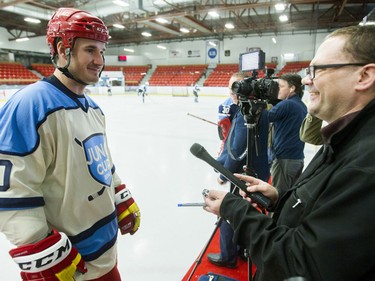 Former Calgary Flames player Curtis Glencross speaks with Postmedia before a Juno Cup practice game at Max Bell Centre in Calgary, Alta., on Thursday, March 31, 2016. Musicians and former NHLers were prepping for the Juno Cup hockey game set for this Friday, part of events leading up to the Juno Awards on Sunday at the Saddledome. Lyle Aspinall/Postmedia Network