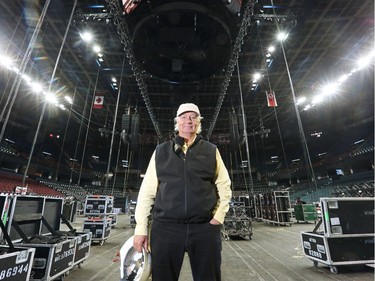 Karel Noordover, technical producer for Insight Productions stands near centre ice Tuesday as the Scotiabank Saddledome is transformed to host the 2016 Junos on Sunday. Gavin Young/Postmedia