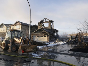Three homes were destroyed and another badly damaged in an overnight blaze in Kincora on Tuesday.