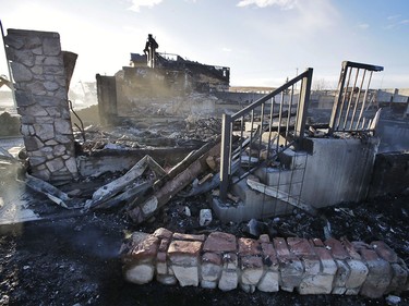 There is little left of two of four houses that were hit by an early morning blaze in northwest Calgary.