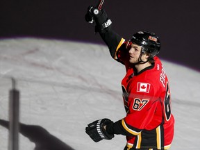 Calgary Flames' Michael Frolik takes a turn after being named one of the three stars of Wednesday's 4-1 win over the Winnipeg jets.