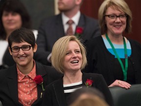 Premier Rachel Notley looks for familiar faces in the gallery of the Alberta legislature before the throne speech.